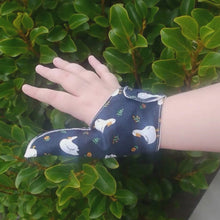 Load and play video in Gallery viewer, Thumb guard.  A fabric thumb glove to help end thumb sucking and other habits involving the hands.. Can be pulled off by babies and toddlers
