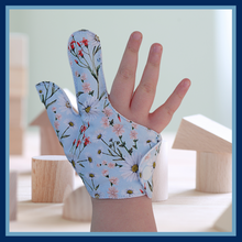 Load image into Gallery viewer, Combined thumb and finger guard for children who want to stop finger sucking.  Blu flower themed fabric
