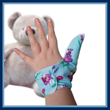 Load image into Gallery viewer, blue coloured thumb guard with a bugs and bees floral design. Moisture resistant lining, to help stop thumb sucking. Made by The Thumb Guard Store
