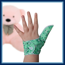 Load image into Gallery viewer, green coloured thumb guard with a lamb design. Moisture resistant lining, to help stop thumb sucking. Made by The Thumb Guard Store
