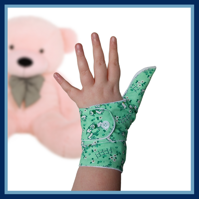 green coloured cuffed thumb guard with a lamb design. Moisture resistant lining, to help stop thumb sucking. Made by The Thumb Guard Store