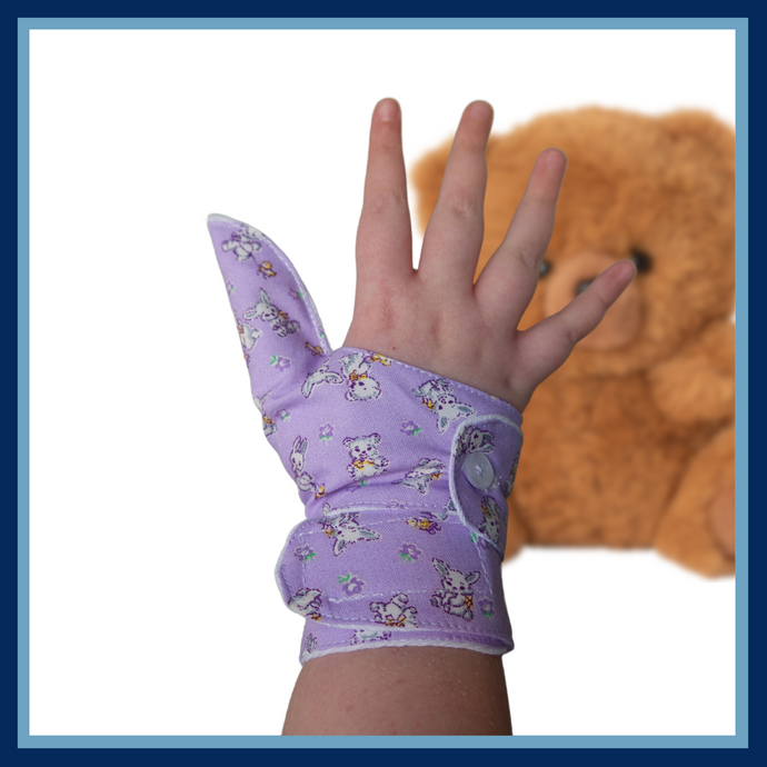 Double cuffed baby and toddler guard in a lavender coloured fabric with a rabbit and bear design. Guard made by The Thumb Guard Store, to help babies and toddlers stop thumb sucking. Moisture resistant lining. Extra cuff helps prevent pulling off.