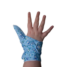 Load image into Gallery viewer, Double cuffed baby and toddler guard in a blue coloured fabric with a lamb design. Guard made by The Thumb Guard Store, to help babies and toddlers stop thumb sucking. Moisture resistant lining. Extra cuff helps prevent pulling off.
