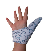 Load image into Gallery viewer, Blue  and white coloured thumb guard with an animal  design. Moisture resistant lining, to help stop thumb sucking. Made by The Thumb Guard Store.
