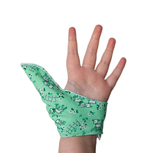 Load image into Gallery viewer, green coloured thumb guard with a lamb design. Moisture resistant lining, to help stop thumb sucking. Made by The Thumb Guard Store
