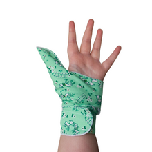 Load image into Gallery viewer, green coloured cuffed thumb guard with a lamb design. Moisture resistant lining, to help stop thumb sucking. Made by The Thumb Guard Store
