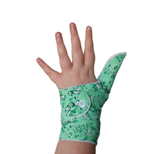 Load image into Gallery viewer, green coloured cuffed thumb guard with a lamb design. Moisture resistant lining, to help stop thumb sucking. Made by The Thumb Guard Store
