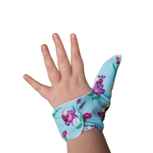 Load image into Gallery viewer, blue coloured thumb guard with a bugs and bees floral design. Moisture resistant lining, to help stop thumb sucking. Made by The Thumb Guard Store
