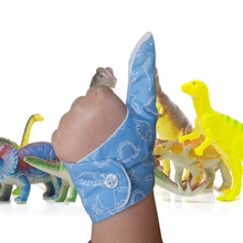 Load image into Gallery viewer, Blue coloured thumb guard with a dinosaur design. Moisture resistant lining, to help stop thumb sucking. Made by The Thumb Guard Store.
