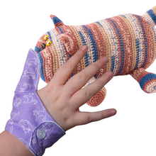 Load image into Gallery viewer, Purple coloured thumb guard with a cat design. Moisture resistant lining, to help stop thumb sucking. Made by The Thumb Guard Store.
