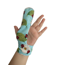 Load image into Gallery viewer, Finger guard for children who want to stop finger sucking.  ladybird themed fabric
