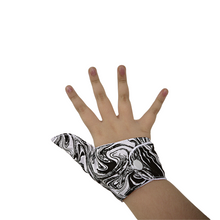Load image into Gallery viewer, Adult size Thumb Guard. Stop thumb sucking or skin picking. Black and white patterned fabric
