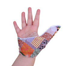 Load image into Gallery viewer, Thumb guard.  A patchwork themed thumb guard to stop thumb sucking habits.
