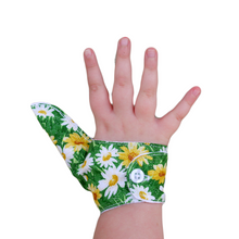 Load image into Gallery viewer, Thumb guard.  A glittery daisy themed thumb guard to stop thumb sucking habits.
