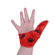 Load image into Gallery viewer, Thumb guard.  A Poppy themed thumb guard to stop thumb sucking habits.
