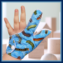 Load image into Gallery viewer, Combined thumb and finger guard for children who want to stop finger sucking. Caterpillar themed fabric
