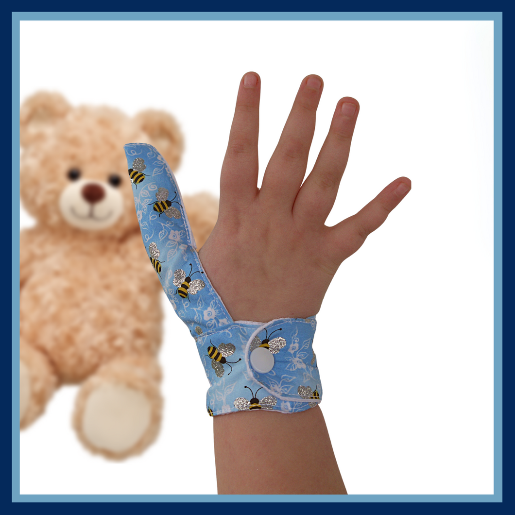 Thumb  Glove to guard against thumb sucking habits in children and adults.  Fastens around wrist.
