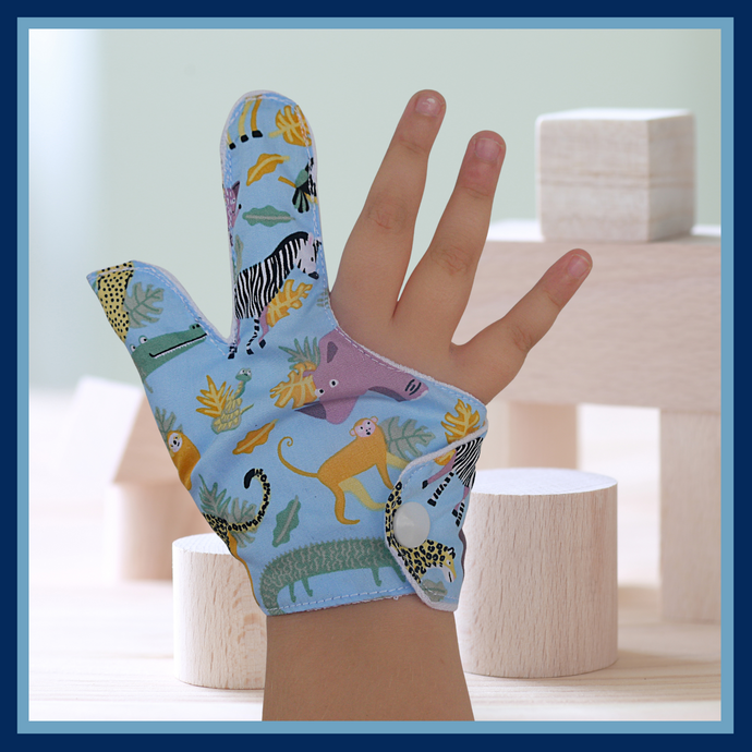A thumb guard that also covers the index finger to help stop thumb and finger-sucking habits in kids. This thumb and finger guard features colorful jungle animals on a blue background. It has a moisture-resistant lining. The Thumb Guard Store 