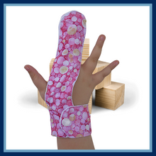 Load image into Gallery viewer, A finger guard to help children stop finger-sucking and other habits. Guard has a moisture-resistant lining. The outer fabric features a pink and lemon bubble design design.  A choice of fastenings is available. The Thumb Guard Store
