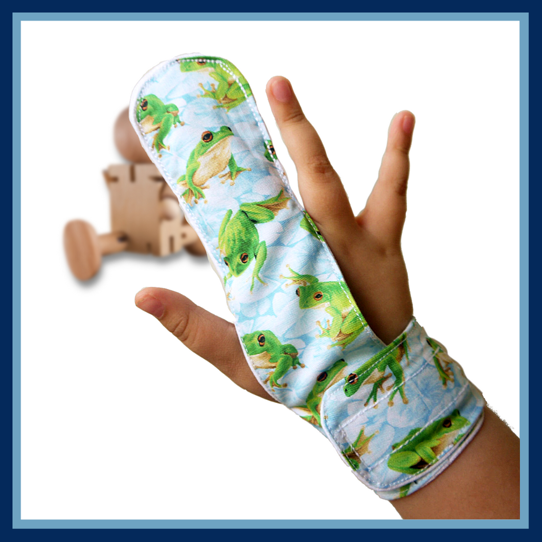 Frog themed finger guard to hep stop finger sucking habits.  Has a moisture resistant lining and choice of fastenings. Made by The Thumb Guard Store