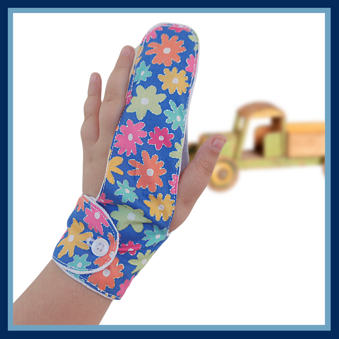 A finger guard to help stop finger sucking habits. Fabric background is blue and features colourful flowers. Has a moisture resistant lining . Made by the Thumb Guard Store