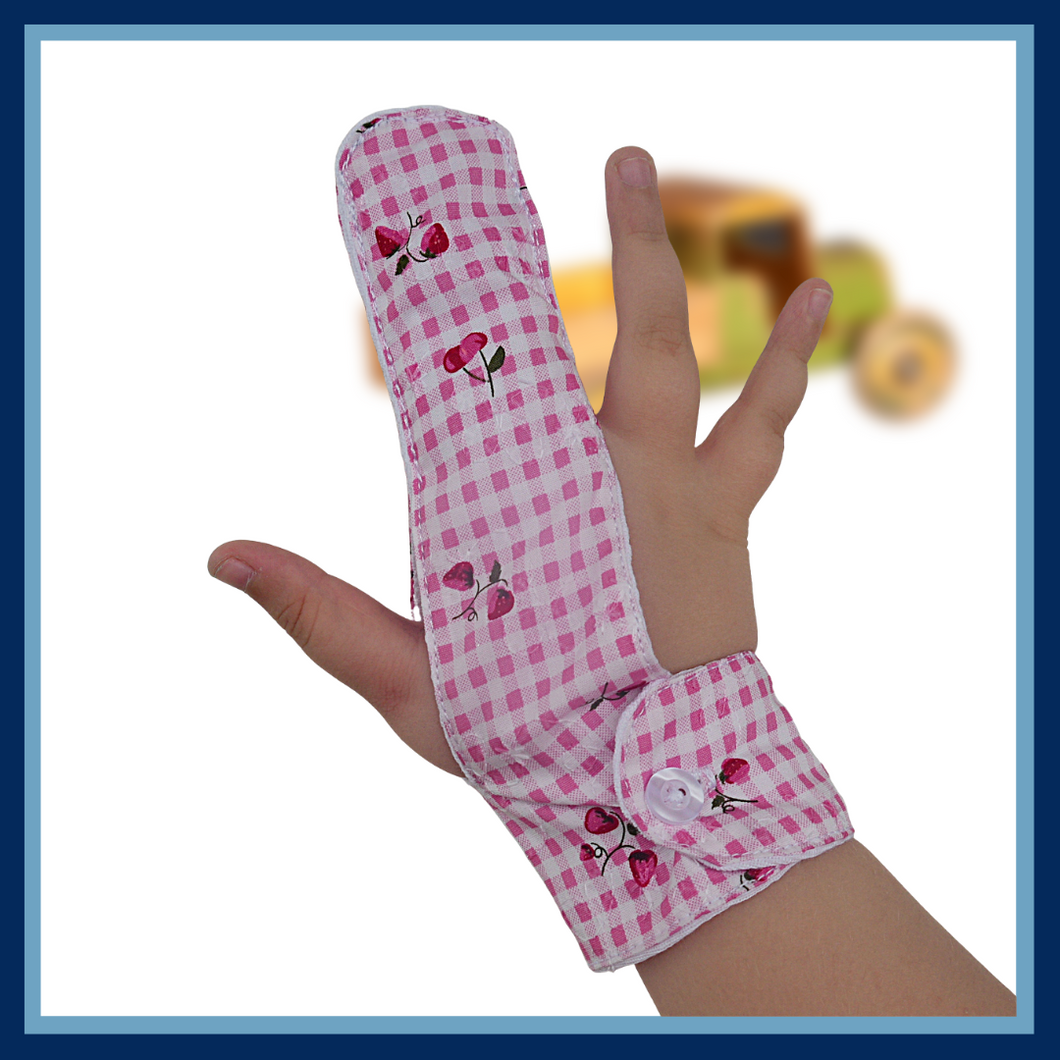 Finger guard is made from pink gingham fabric featuring strawberries and cherries, designed to help stop finger sucking, with a moisture-resistant lining and a choice of fastenings for comfortable and effective use. The Thumb Guard Store