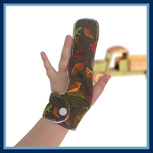 Load image into Gallery viewer, Finger guards from the Thumb Guard Store with moisture-resistant lining and three fastening options. Made with quality brown fabric featuring creatures from the forest floor, they are easy to wash by hand and fast drying for ultimate convenience.
