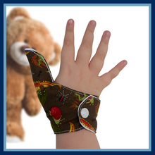 Load image into Gallery viewer, Thumb guards from the Thumb Guard Store with moisture-resistant lining and three fastening options. Made with quality brown fabric featuring creatures from the forest floor, they are easy to wash by hand and fast drying for ultimate protection.
