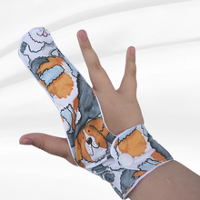 Load image into Gallery viewer, Finger guard for children who want to stop finger sucking.  Dog themed fabric
