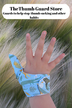 Load image into Gallery viewer, Thumb Guard thumb cover, Stop thumb sucking and other habits. Wild animal themed fabric
