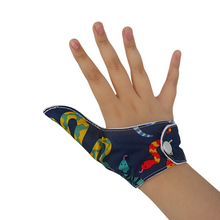 Load image into Gallery viewer, A fabric thumb guard to help stop thumb-sucking habits. The illustrated thumb guard has a colorful snake-themed outer fabric on a dark blue background. It has a moisture-resistant lining fabric and a snap fastening.  The Thumb Guard Store
